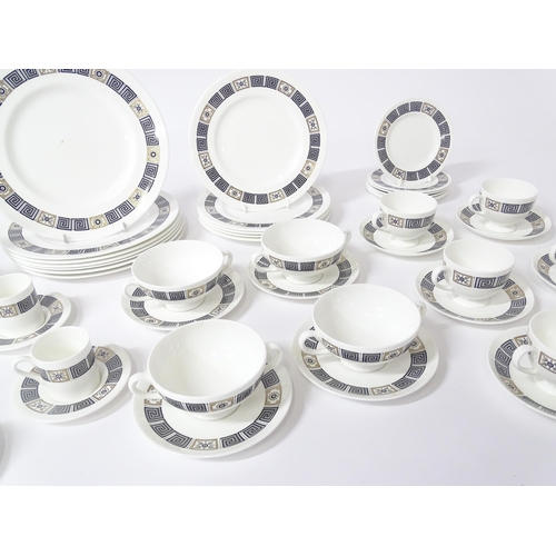 74 - A quantity of Wedgwood dinner wares in the Asia pattern to include plates, twin handled soup bowls, ... 