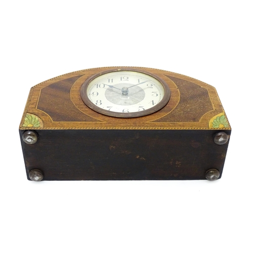 66 - A German 8-day mahogany cased mantel clock with inlaid detail to case. Approx 5 1/4