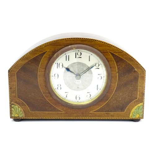 66 - A German 8-day mahogany cased mantel clock with inlaid detail to case. Approx 5 1/4