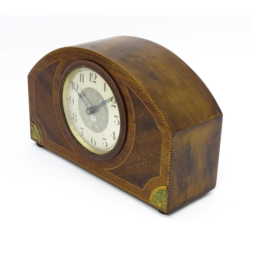 66 - A German 8-day mahogany cased mantel clock with inlaid detail to case. Approx 5 1/4