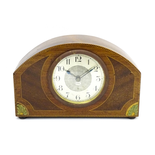 66 - A German 8-day mahogany cased mantel clock with inlaid detail to case. Approx 5 1/4