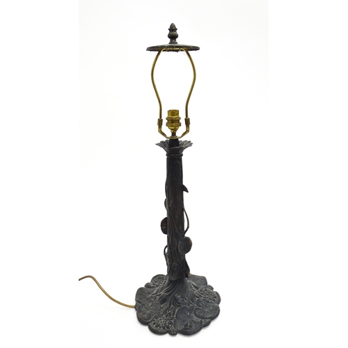 92 - A late 20thC table lamp in the Tiffany Art Nouveau style. Approx. 26