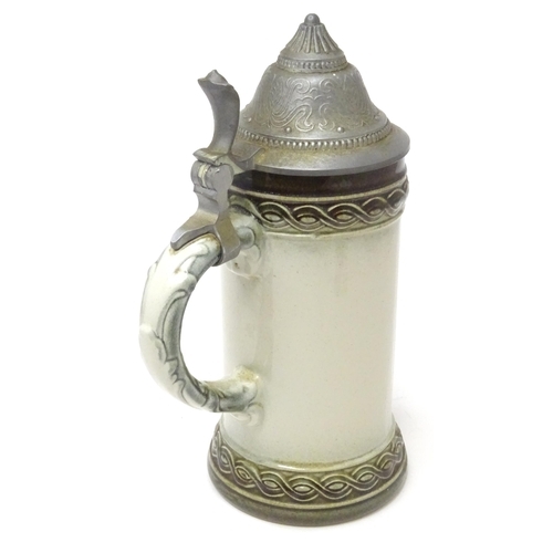 107 - Militaria : a mid 20thC stein tankard, decorated with the insignia of RAF Gütersloh (HQ No.2 Group R... 