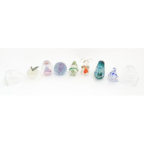 116 - A quantity of assorted glass paperweights to include examples modelled as birds etc. makers includin... 