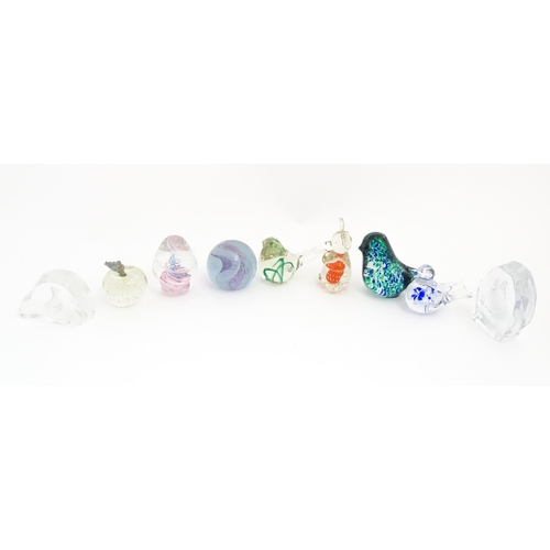 116 - A quantity of assorted glass paperweights to include examples modelled as birds etc. makers includin... 