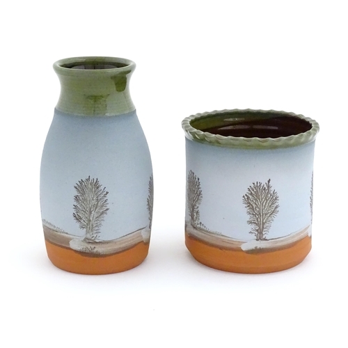 275 - Two items of studio pottery Mike Pollard, comprising a vase and cylindrical pot with tree detail. Mo... 