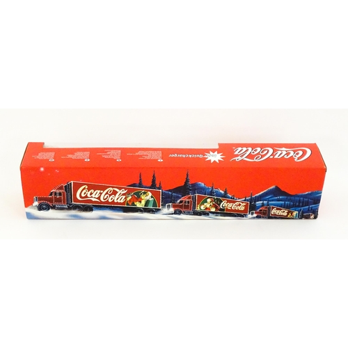 316 - Toy: A Dickie-Spielzeug advertising 2-channel radio controlled Coca Cola Christmas lorry. Boxed. Box... 