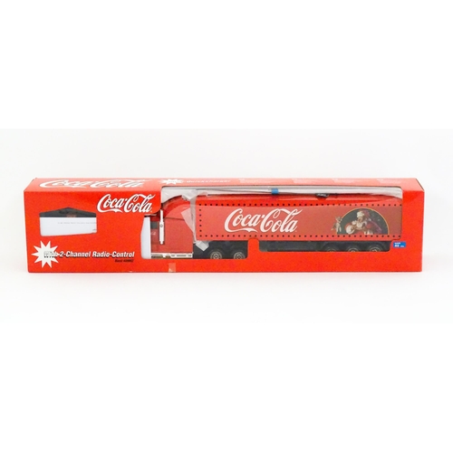 316 - Toy: A Dickie-Spielzeug advertising 2-channel radio controlled Coca Cola Christmas lorry. Boxed. Box... 