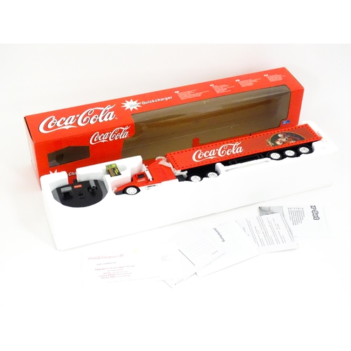 316 - Toy: A Dickie-Spielzeug advertising 2-channel radio controlled Coca Cola Christmas lorry. Boxed. Box... 