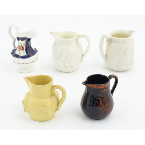 328 - Five assorted Victorian and later miniature jugs to include a hand painted example with floral detai... 