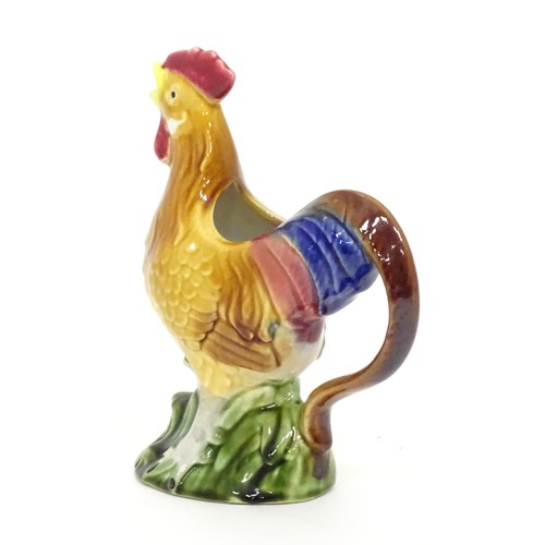 333 - A ceramic jug modelled as a chicken. Approx 10