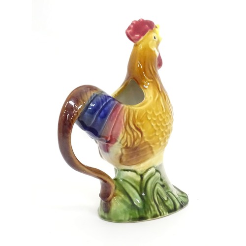 333 - A ceramic jug modelled as a chicken. Approx 10