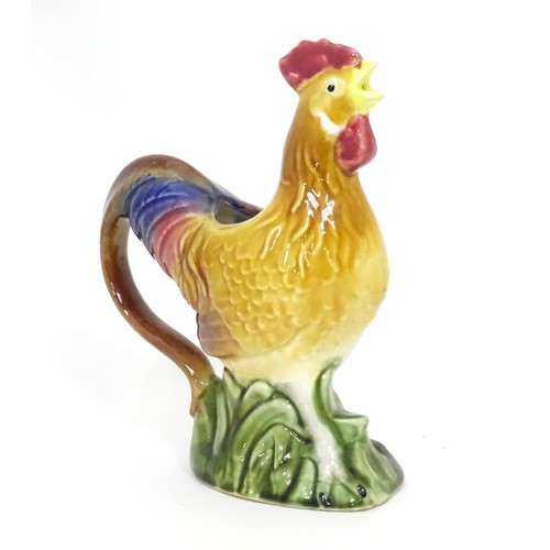 333 - A ceramic jug modelled as a chicken. Approx 10