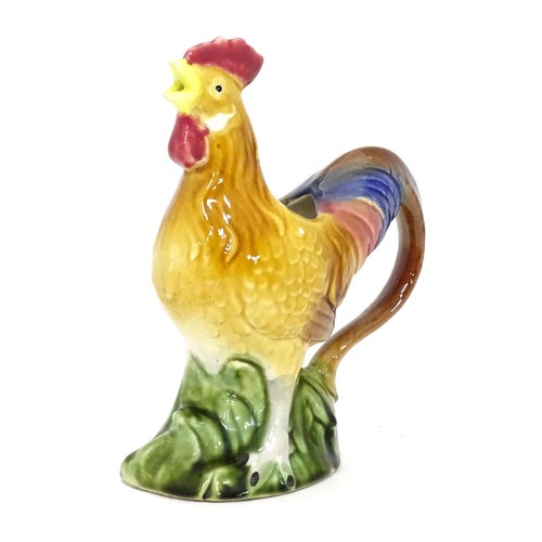 333 - A ceramic jug modelled as a chicken. Approx 10