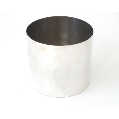 451 - A white metal beaker of circular form. Approx. 3 1/4