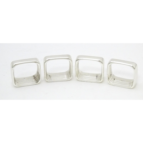 460 - A set of four 'capri' pattern silver plate napkin rings. Produced for Wedgwood.