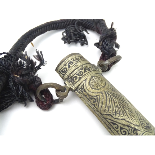 502 - A Middle Eastern / North African Jambiya dagger / knife and sheath with rope belt, approx 16