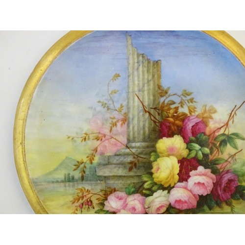 520 - A 19thC roundel in the manner of Derby with hand painted decoration depicting an Italian landscape s... 