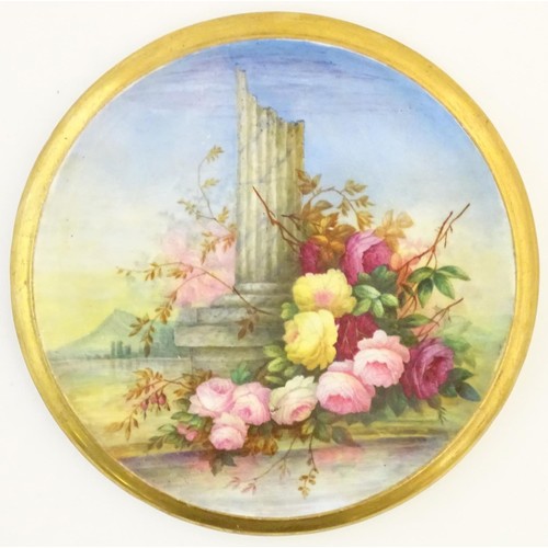 520 - A 19thC roundel in the manner of Derby with hand painted decoration depicting an Italian landscape s... 