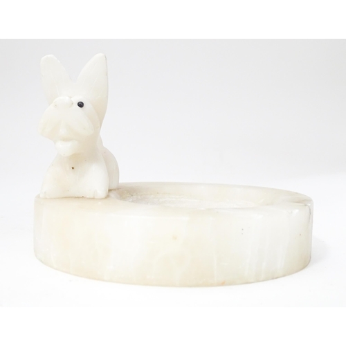 528 - An Art Deco alabaster dish or tray with a stylised West Highland Terrier / Westie / Scotty dog, appr... 