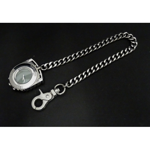 546 - A boxed Diesel watch / stopwatch on chain, approx 2