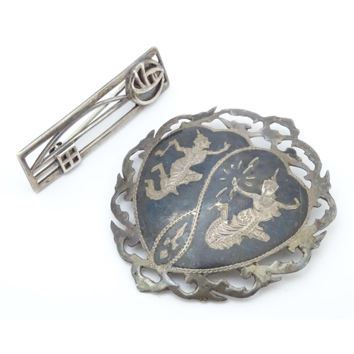 567 - A silver brooch inspired by the designs of Charles Rennie Macintosh, together with a brooch marked S... 