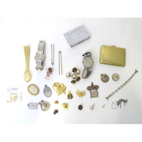 569 - A quantity of assorted miscellaneous items to include cigarette cases, horn spoon, badges, brooches ... 