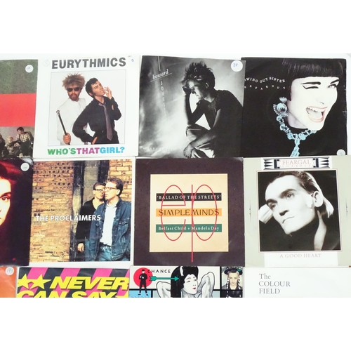 592 - A quantity of late 20thC 45rpm vinyl singles, including picture sleeve examples Eurythmics, UB40, Bo... 