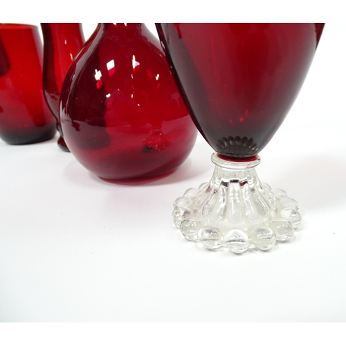 646 - A quantity of assorted red glassware to include vases, glasses etc. The tallest approx 10