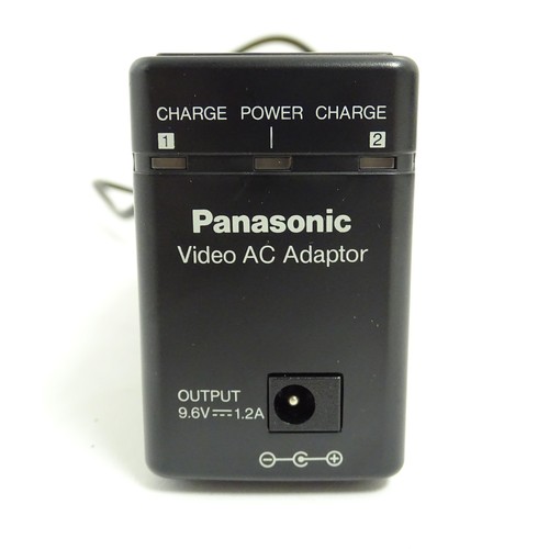 666 - A cased Panasonic MC90 VHS-C video camera.