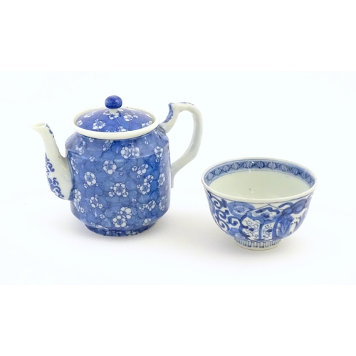 698 - A Chinese blue and white teapot decorated with prunus blossom. Together with a Chinese blue and whit... 