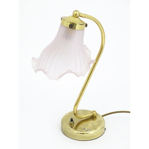 702 - A late 20thC table lamp with pink shade, approx 13 1/2