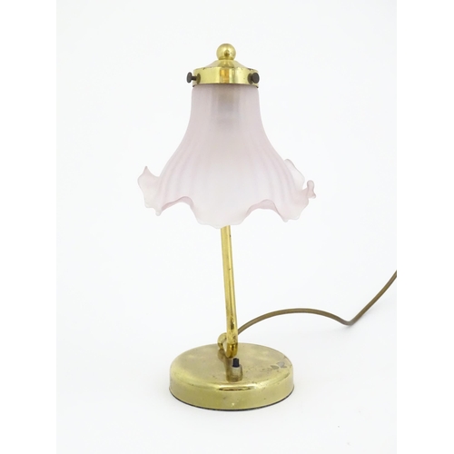 702 - A late 20thC table lamp with pink shade, approx 13 1/2