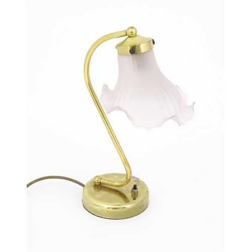 702 - A late 20thC table lamp with pink shade, approx 13 1/2