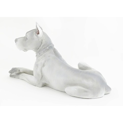 742 - A Continental model of a Great Dane dog. Indistinctly signed under. Approx. 13 1/2