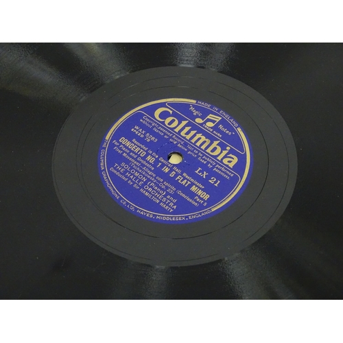 751 - A mid 20thC record case, containing a quantity of 78rpm vinyl records, including Capitol Junior reco... 