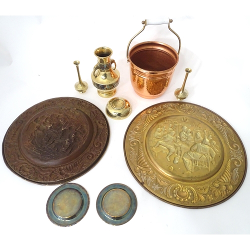 757 - A quantity of assorted brass and copper wares to include chargers, dishes, vase, etc.