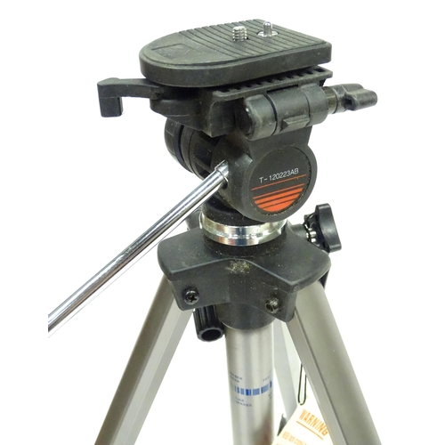 837 - A cased telescoping and extending Vanguard camera / photography tripod, approx 52