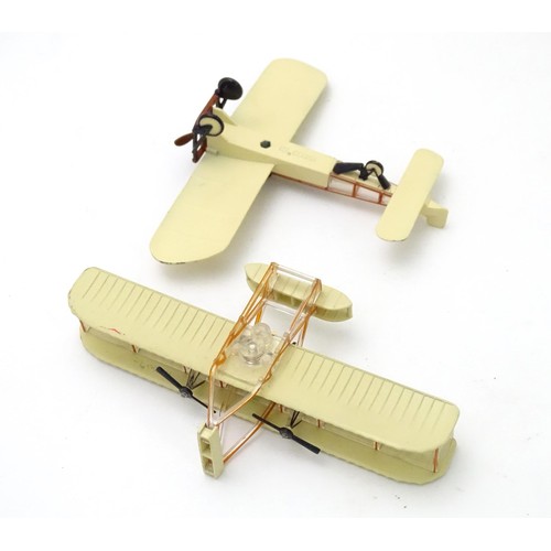 877 - Toys: A quantity of assorted scale model planes and vehicles, comprising four Corgi biplanes, Corgi ... 