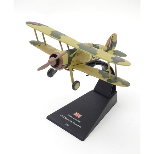 877 - Toys: A quantity of assorted scale model planes and vehicles, comprising four Corgi biplanes, Corgi ... 