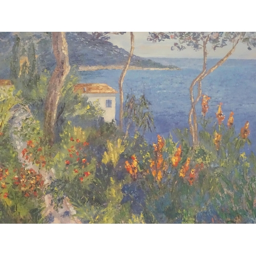 878 - A 20thC colour print depicting a Mediterranean coastal scene. Approx. 25