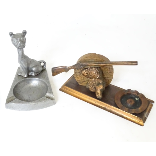 121 - A quantity of assorted 20thC novelty ashtrays to include one with shotgun and dog head detail, one w... 