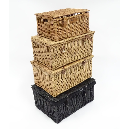 178 - Four wicker baskets / hampers to include examples by Fortnum & Mason, Harvey Nichols etc. Largest ap... 