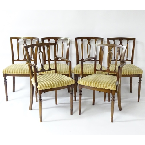 190 - A set of eight modern dining chairs with pierced back splats and raised on canted tapering front leg... 