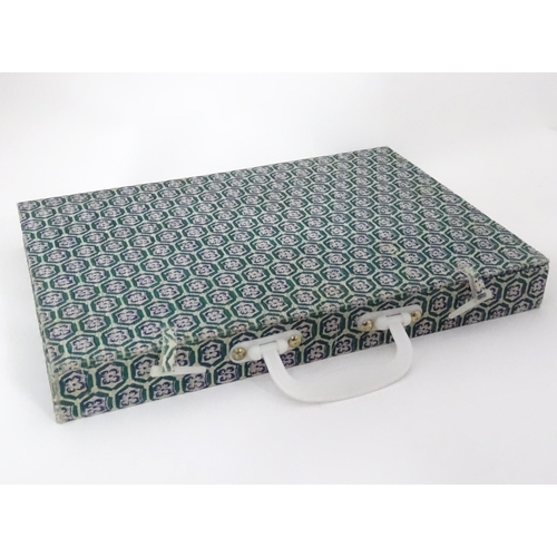 242 - A modern mahjong set in a fabric covered box. Box approx. 13 1/4