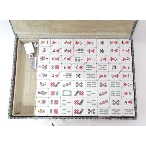 242 - A modern mahjong set in a fabric covered box. Box approx. 13 1/4