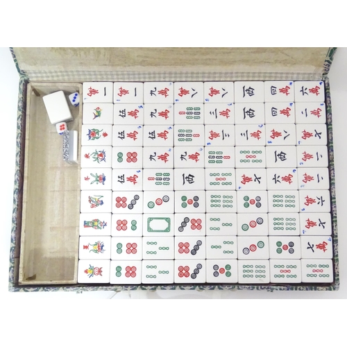 242 - A modern mahjong set in a fabric covered box. Box approx. 13 1/4