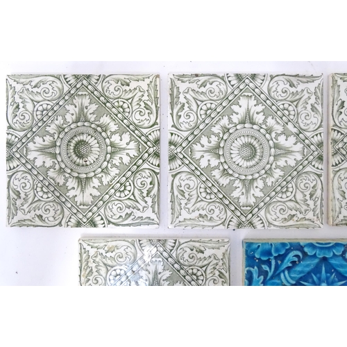 274 - Four late 19th / early 20thC tiles decorated with acanthus scroll detail. Marked A.M. Ltd. Together ... 