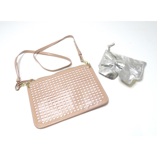 291 - A Kurt Geiger bag with heart detail and an L. K. Bennett purse with bow detail. Largest approx. 9 1/... 