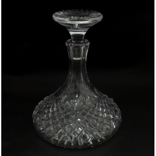 292 - A cut glass ships decanter. Approx. 9 3/4